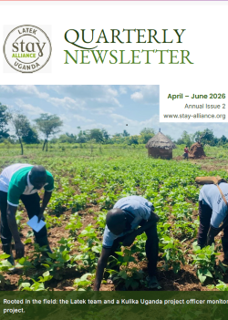 Stay Alliance Uganda quarterly newsletter cover shows farmers working in a green field under the title April–June 2026.